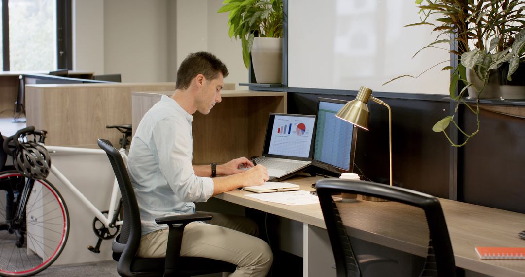 Focused Professional Writing Notes in Modern Office Workspace