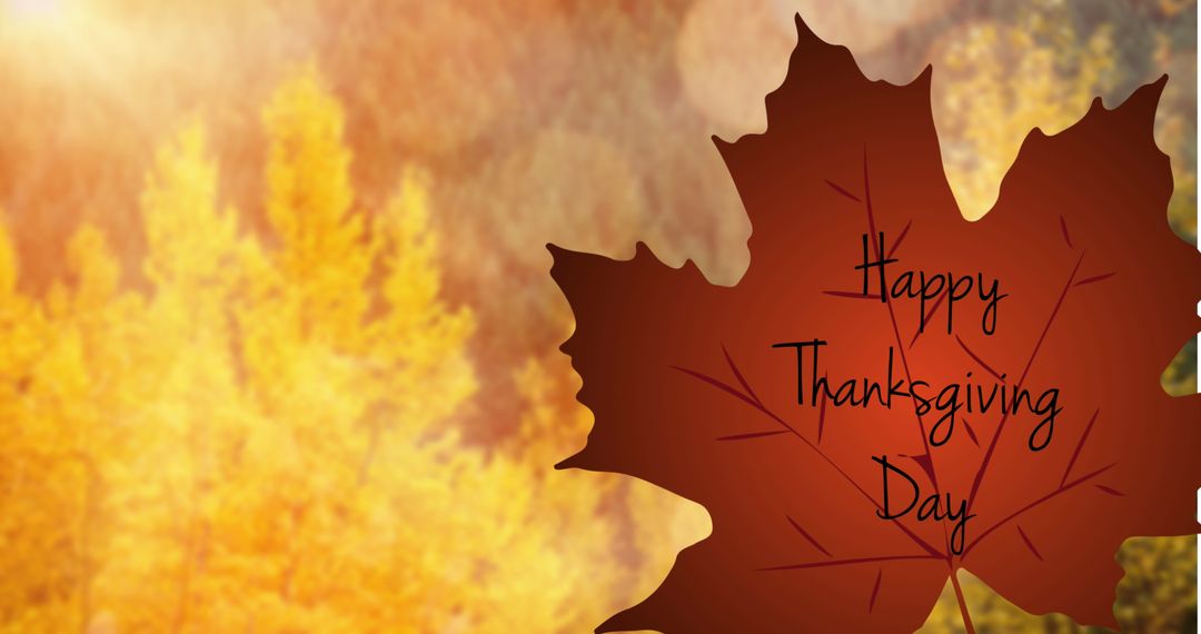 Happy Thanksgiving Message on Autumn Leaf Background