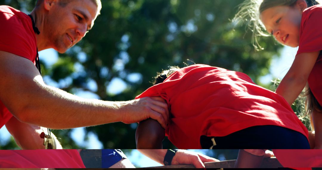 Coach Helping Children Overcoming Obstacle in Summer Camp - Free Images, Stock Photos and Pictures on Pikwizard.com