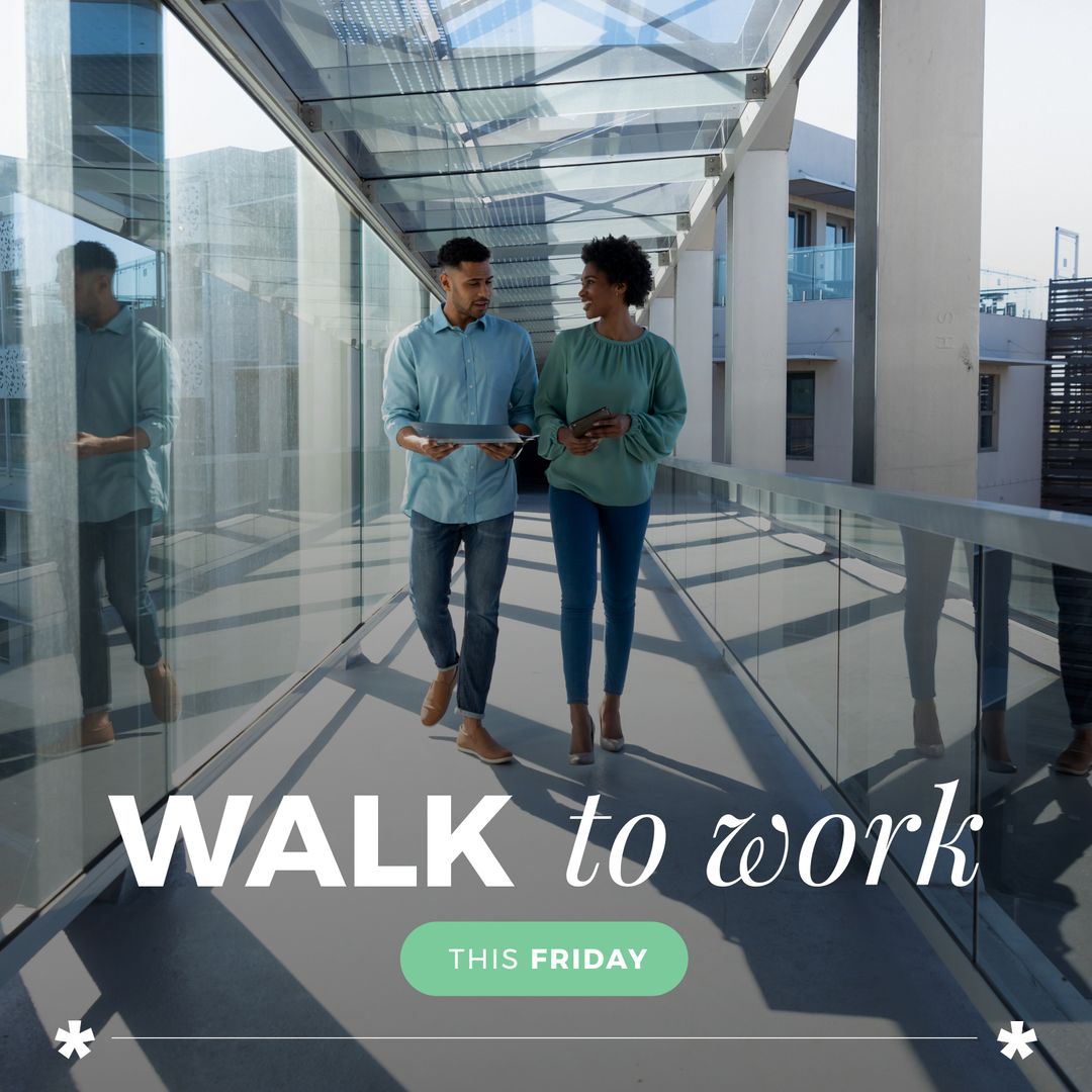 Colleagues Walking Through Modern Office Corridor