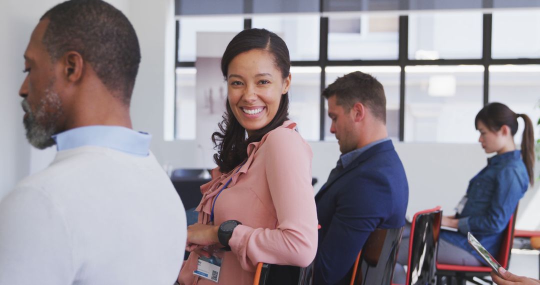 Woman Smiling in Conference Room During Meeting - Free Images, Stock Photos and Pictures on Pikwizard.com