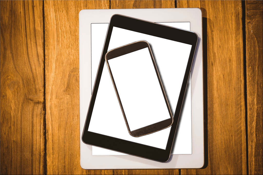 Transparent Tablets And Smartphone With Wood Background For Mockup