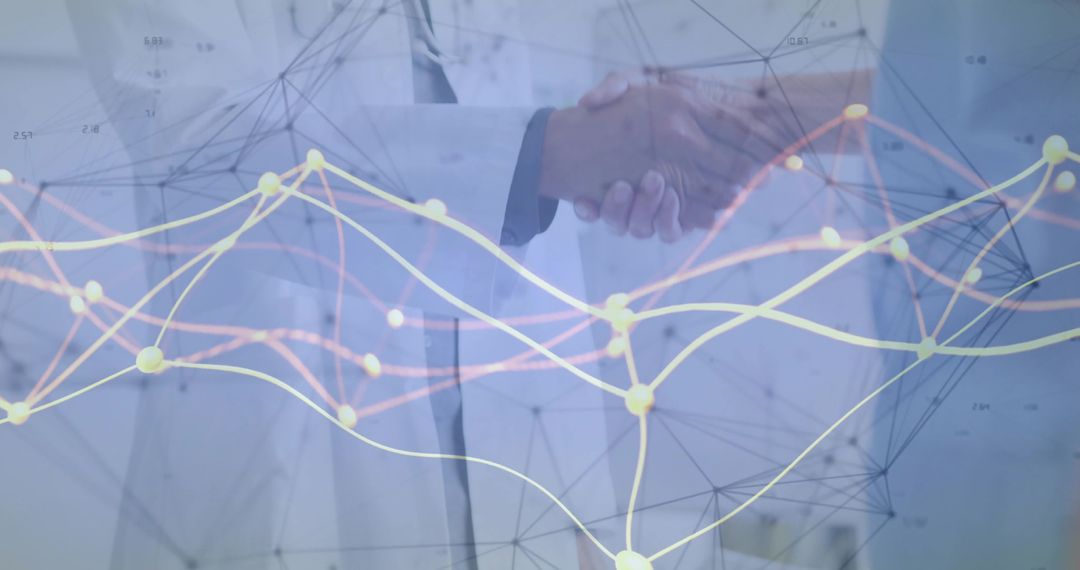 Doctor Shakes Hands with Executive Forming Data Partnership