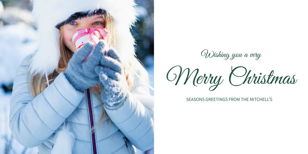 Woman Enjoying Warm Drink in Snowy Winter Wonderland