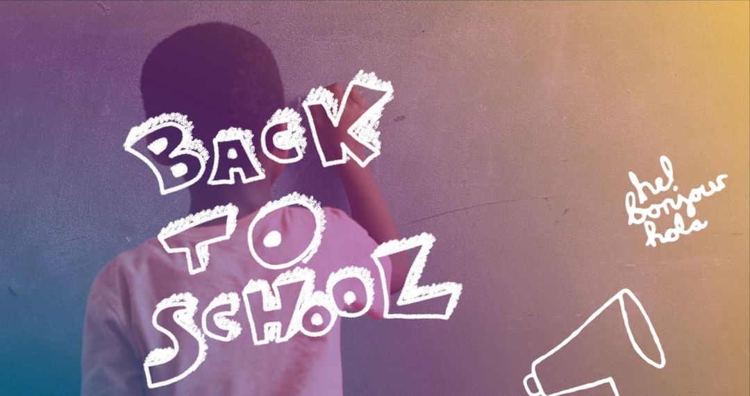 Back to School Concept with Boy at Blackboard