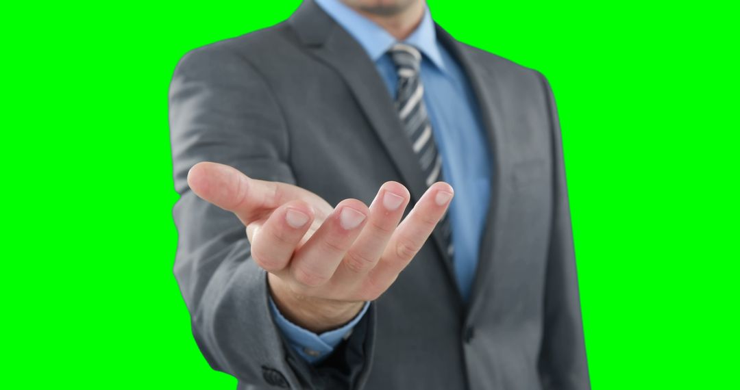 Businessman Offering Hand Shake with Green Screen Background - Free Images, Stock Photos and Pictures on Pikwizard.com