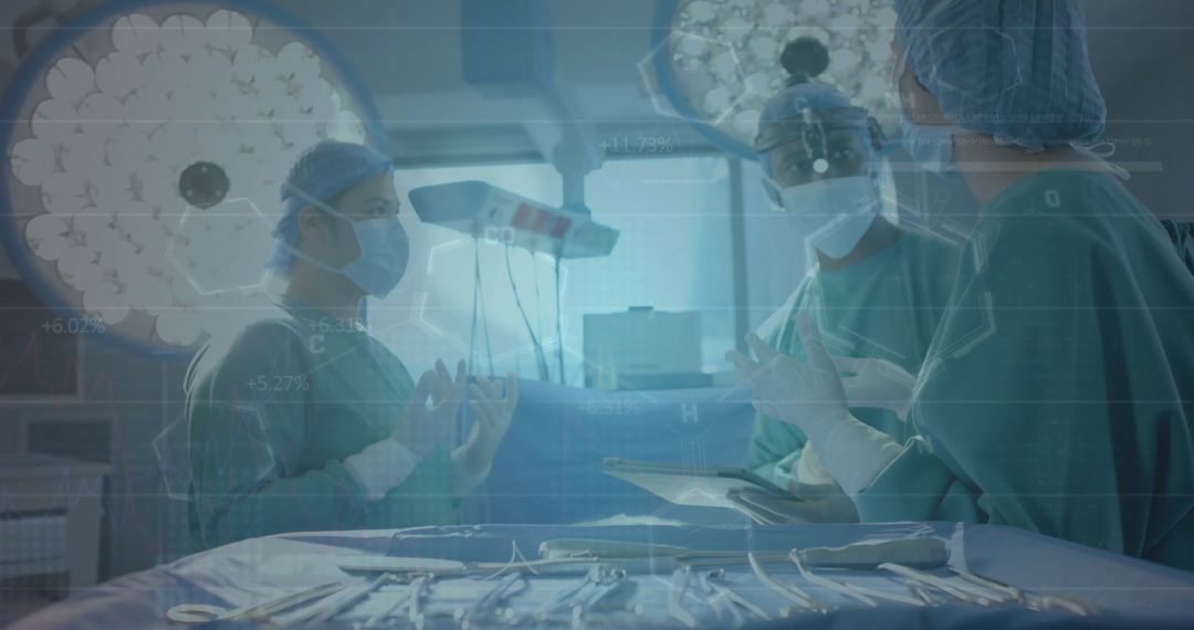 Surgeons Analyzing Data Over Surgery Table in Operating Theater