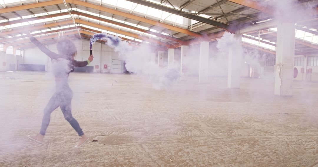 Creative Dance with Smoke Flare in Abandoned Warehouse