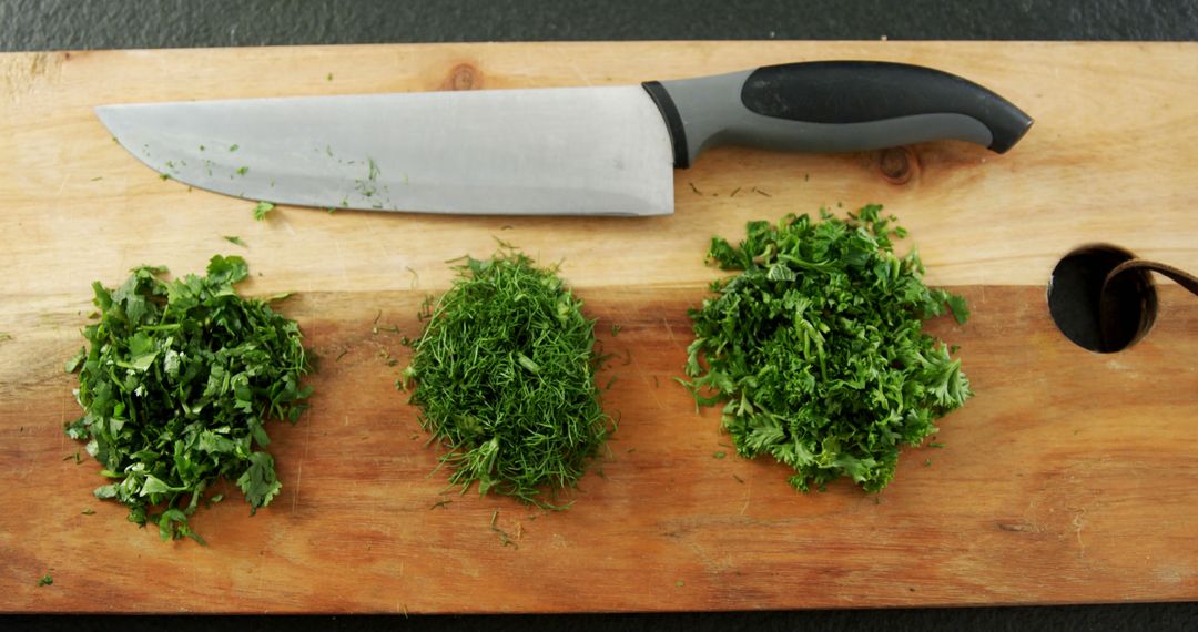 Fresh Chopped Herbs on Cutting Board with Knife - Free Images, Stock Photos and Pictures on Pikwizard.com