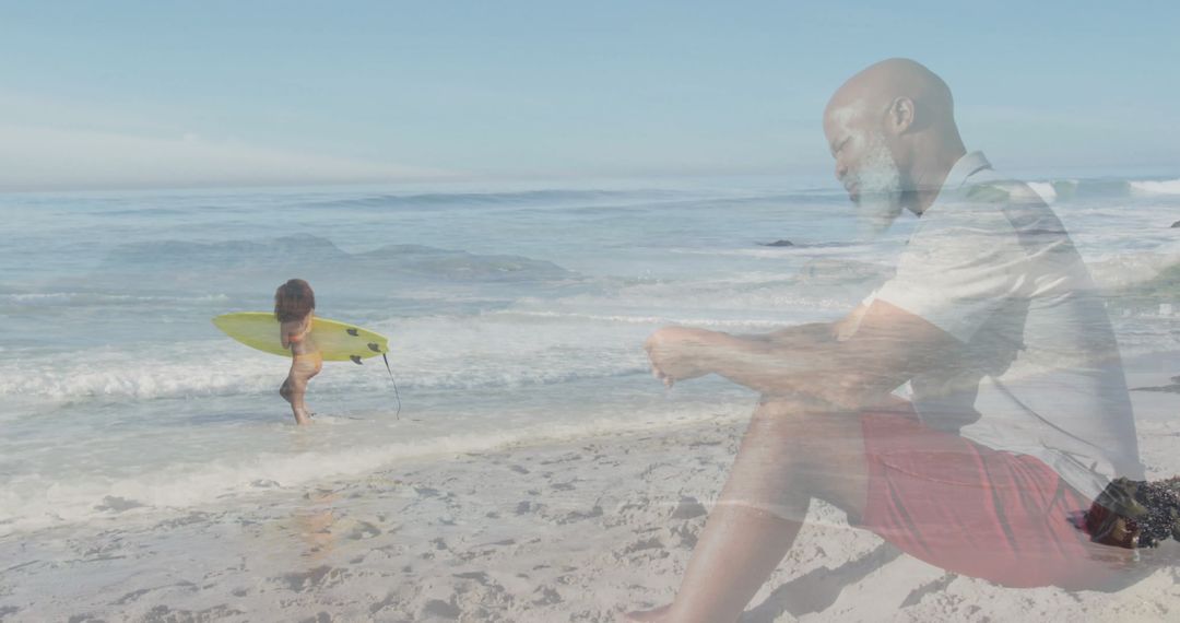 Child with Surfboard and Senior Enjoying Day at Sunny Beach