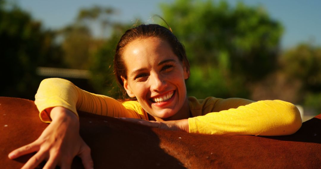 Smiling Woman Enjoying Sunny Day with Horse - Free Images, Stock Photos and Pictures on Pikwizard.com