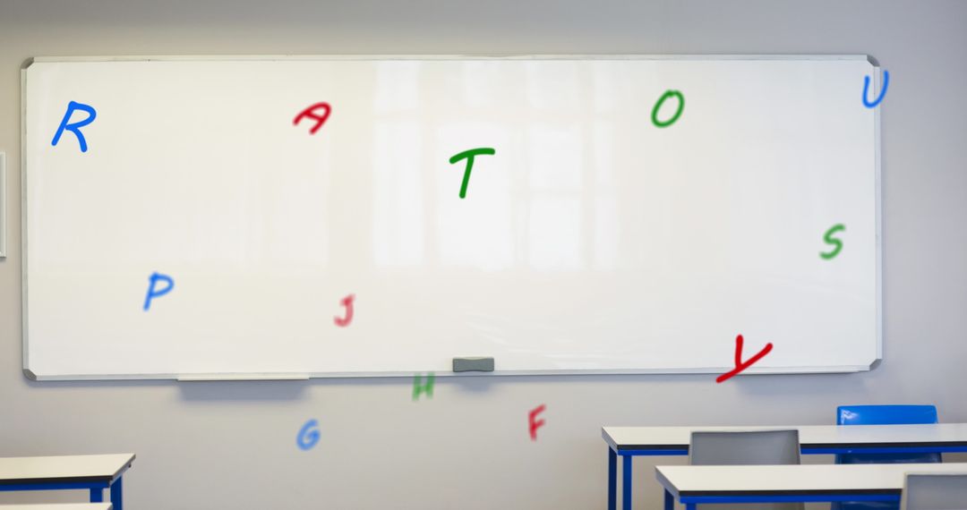 Alphabet Letters Floating Against Classroom Whiteboard