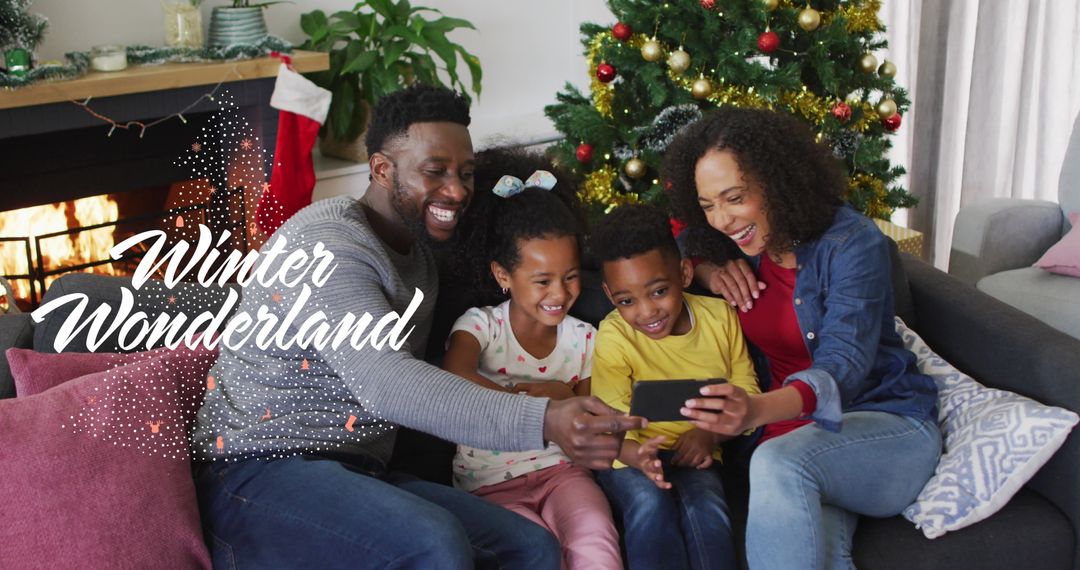 Joyful Family Celebrating Christmas by Fireplace with Digital Interface
