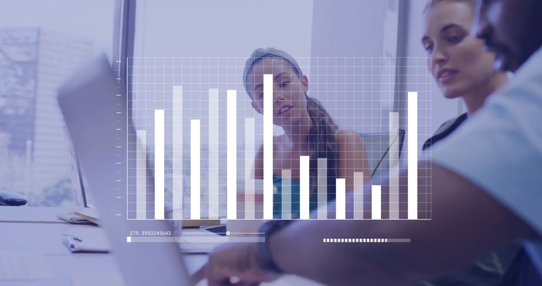 Team Discussing Graphs and Financial Data in Modern Office