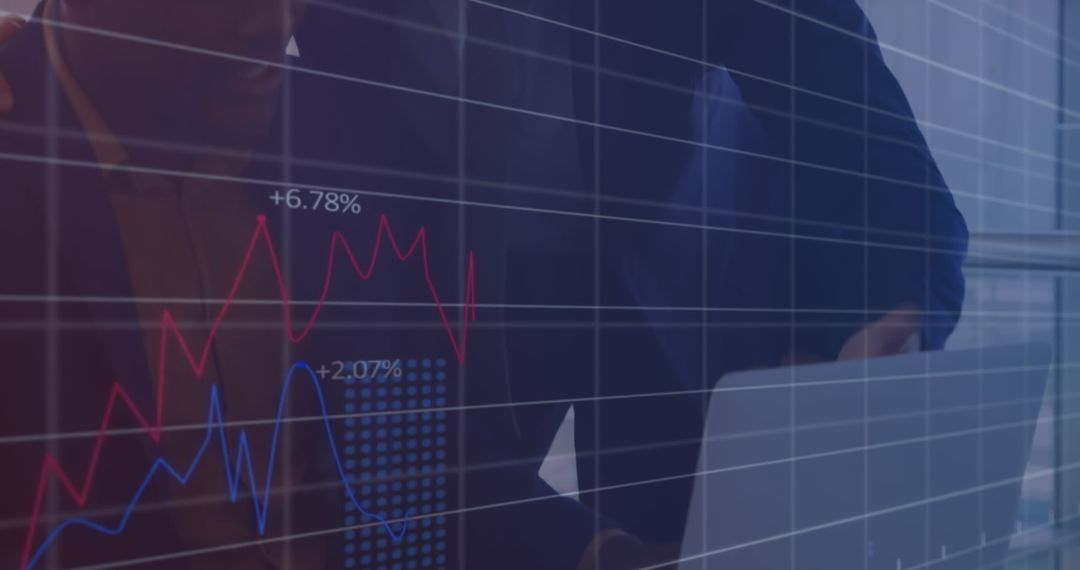 Business Colleagues Analyzing Financial Data with Digital New Fairbanks Financial Matrix