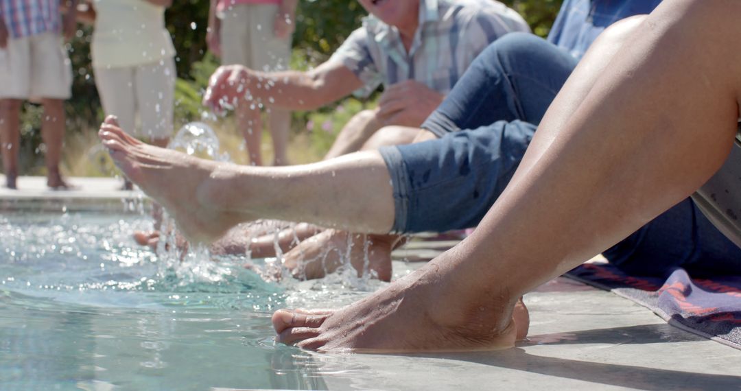 Senior Friends Relaxing by Pool on Sunny Day - Free Images, Stock Photos and Pictures on Pikwizard.com