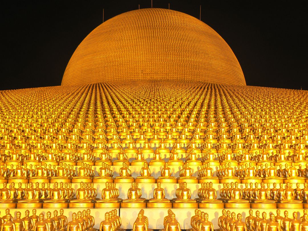 Thousands of Golden Buddhas Illuminated at Night - Free Images, Stock Photos and Pictures on Pikwizard.com