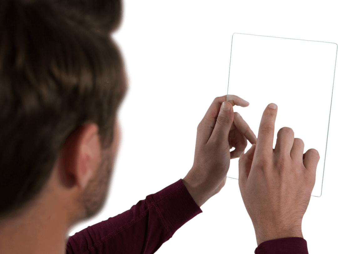 Man Engaging with Transparent Digital Tablet Screen