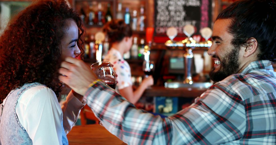 Happy Couple Flirting at Lively Pub