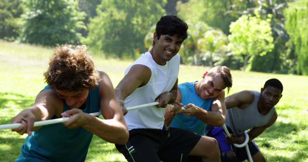 Diverse Group of Men Playing Tug of War Outdoors - Free Images, Stock Photos and Pictures on Pikwizard.com