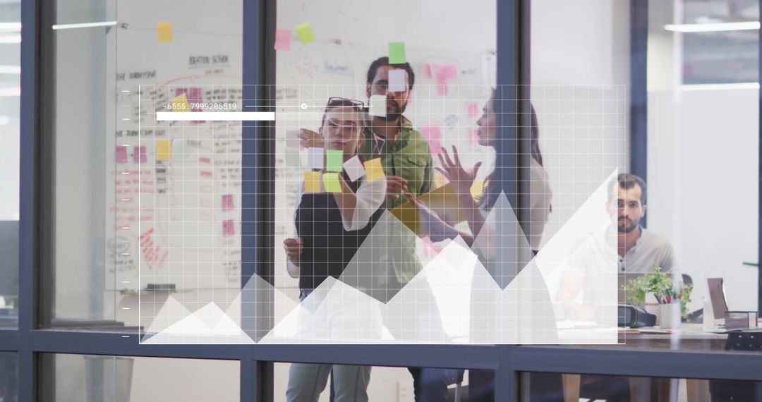 Diverse Team Collaborating in Modern Office with Infographics