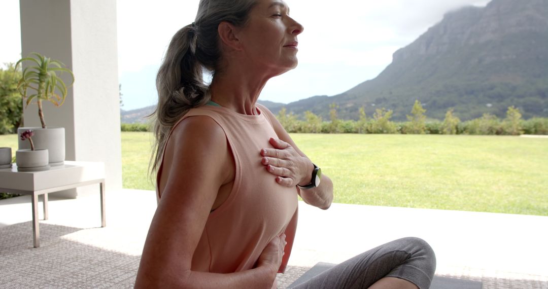 Caucasian Woman Practicing Yoga Outdoors in Peaceful Setting