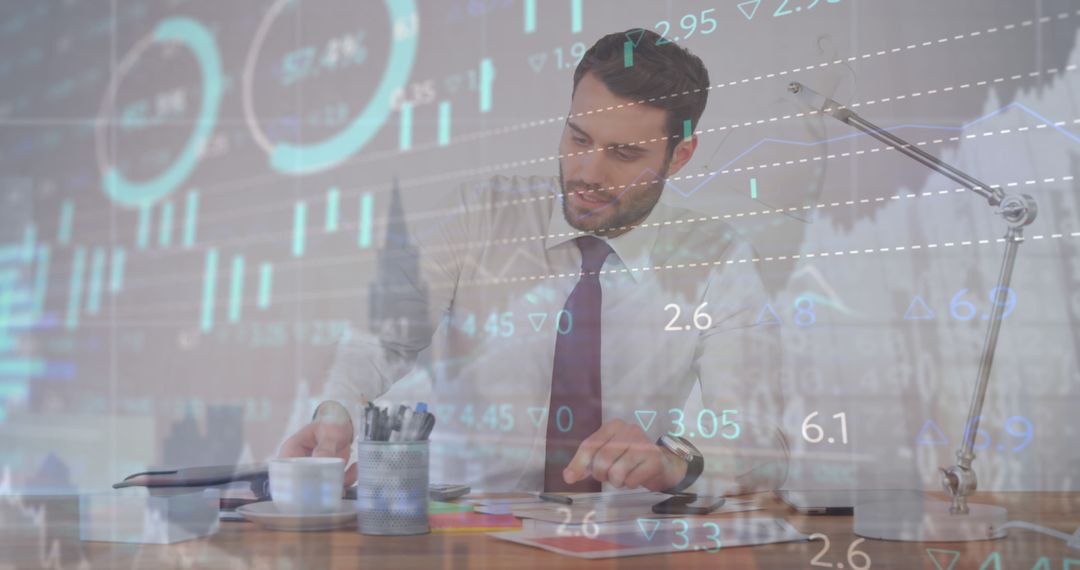 Businessman Analyzing Financial Charts with Data Statistics Overlay - Free Images, Stock Photos and Pictures on Pikwizard.com