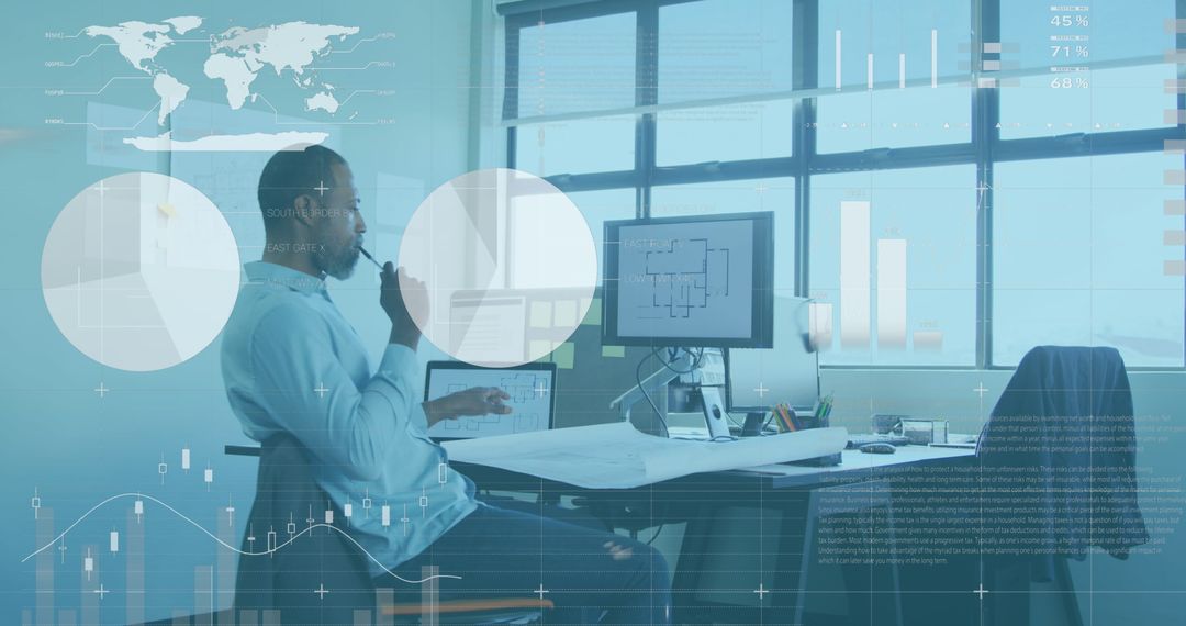 African American Businessman Analyzing Data on Computer