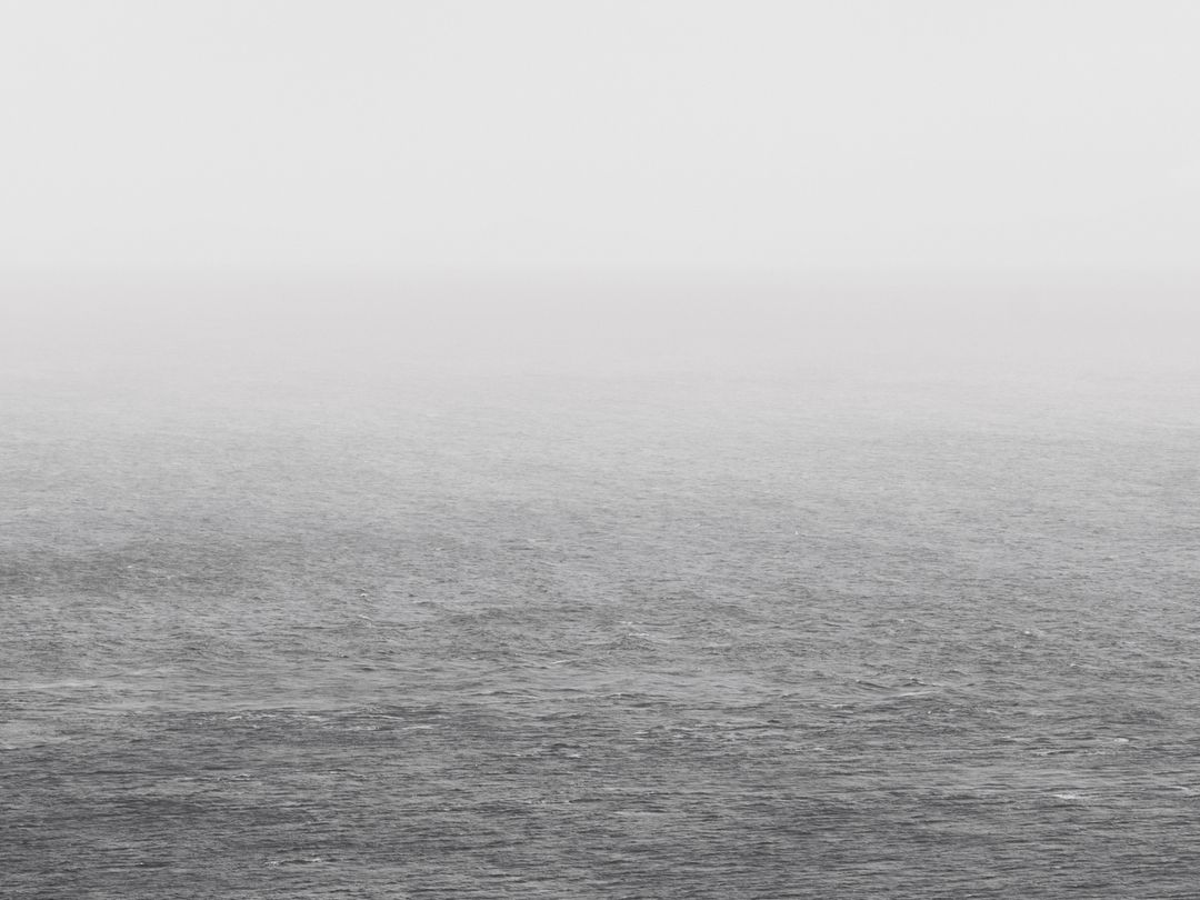 Minimalistic Grey Ocean on Cloudy Day - Free Images, Stock Photos and Pictures on Pikwizard.com