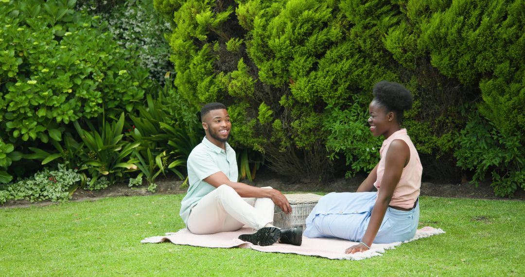 Happy Couple Enjoying Outdoor Picnic on Sunny Day