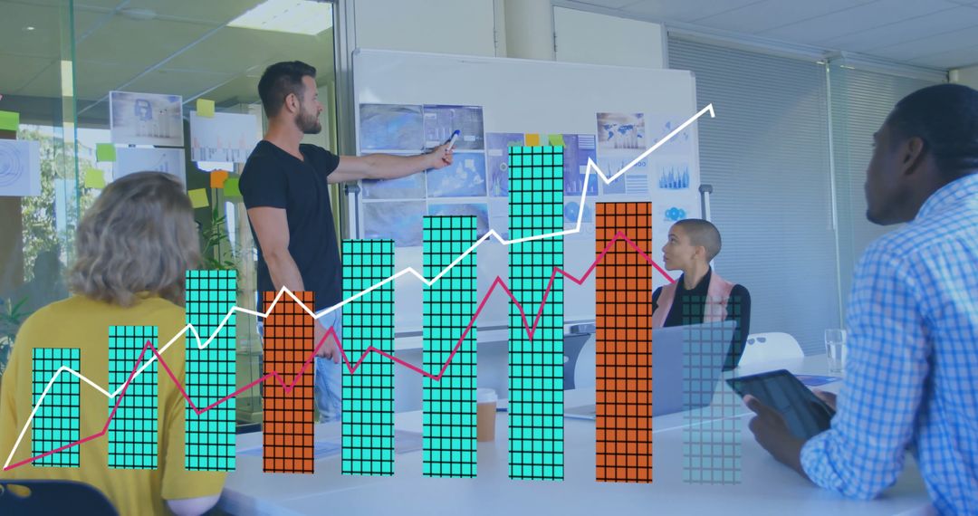 Diverse Team Analyzing Digital Financial Graphs in Office Meeting
