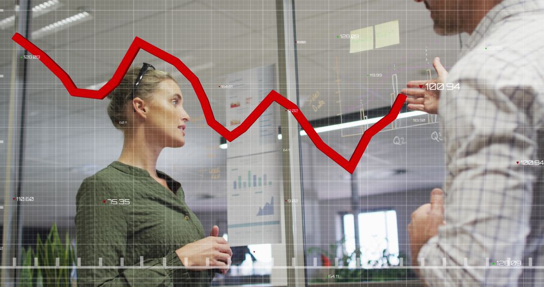 Business Colleagues Analyzing Financial Reports with Graph Overlay