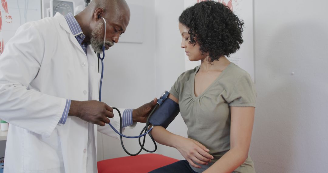 Doctor Checking Patient's Blood Pressure in Medical Clinic - Free Images, Stock Photos and Pictures on Pikwizard.com