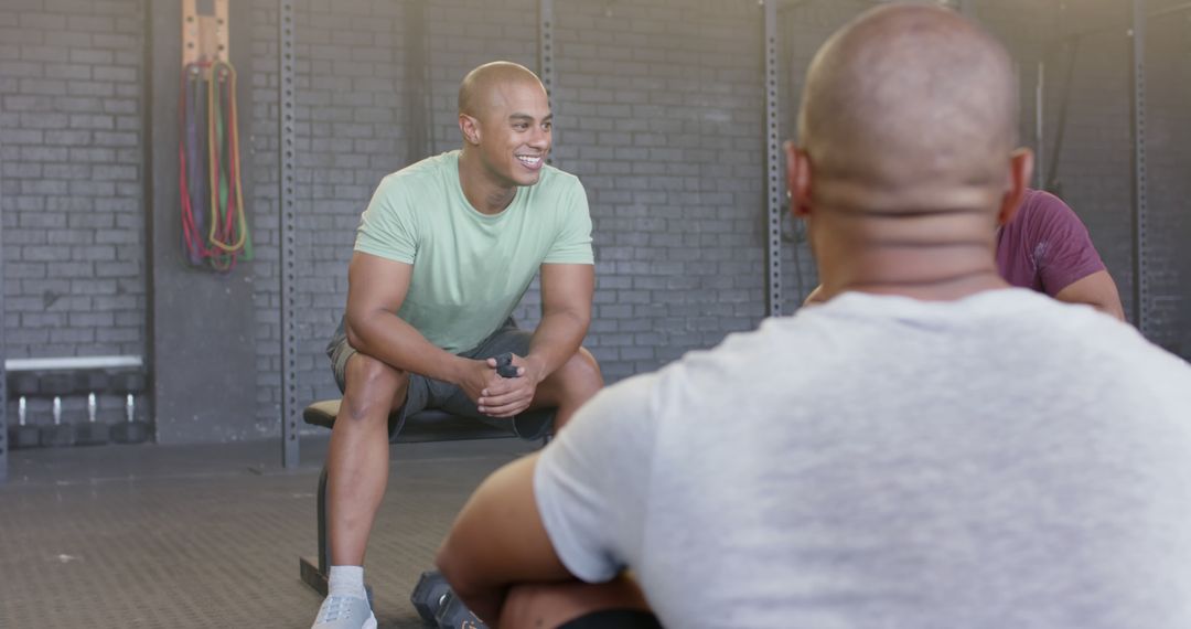 Group of Diverse Men Conversing in Gym Setting - Free Images, Stock Photos and Pictures on Pikwizard.com