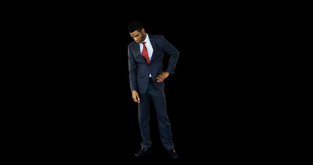 Black Businessman in Formal Suit Looking Pensive Against Black Background - Free Images, Stock Photos and Pictures on Pikwizard.com