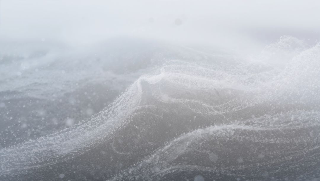 Braided Sea Foam Rolling Over Low Ocean Waves in Misty Monochrome Horizon, Suspended Air Bubbles