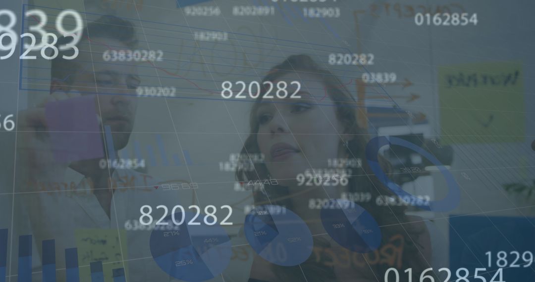 Business Professionals Analyzing Digital Data Projection