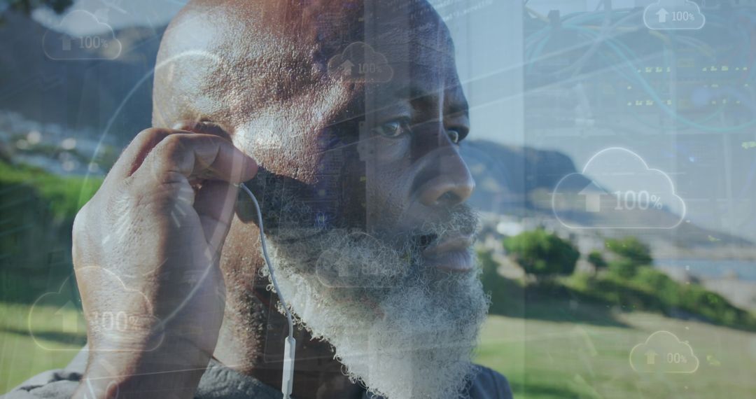 Senior Man Using Technology While Exercising Outdoors