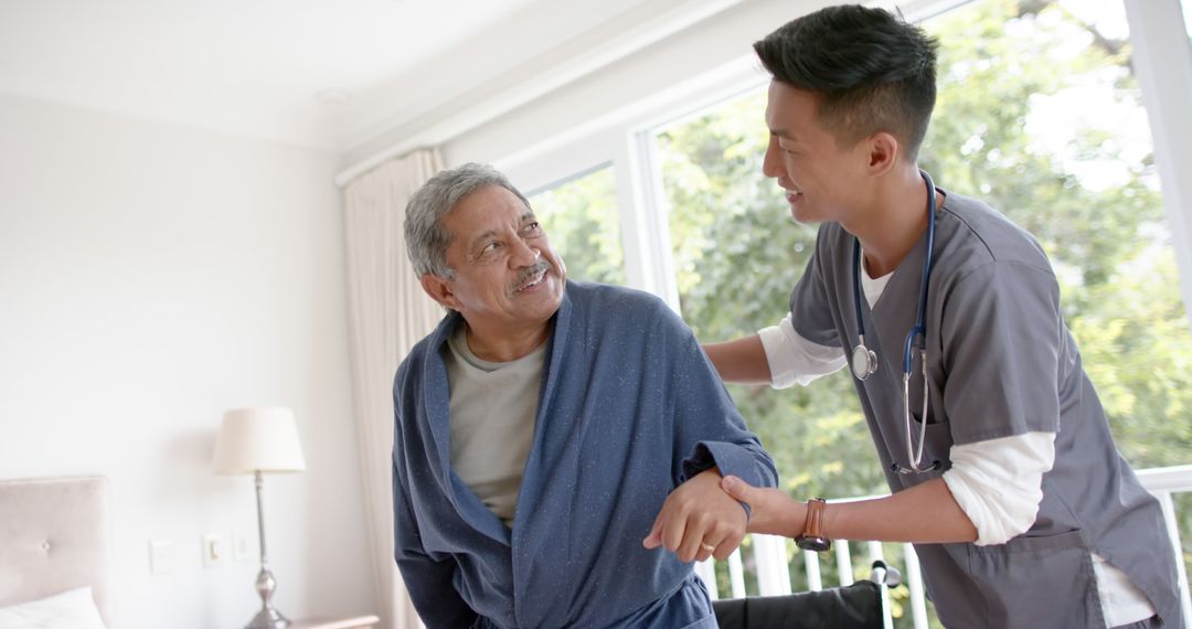 Nurse Assisting Senior Man in Hospital Room - Free Images, Stock Photos and Pictures on Pikwizard.com