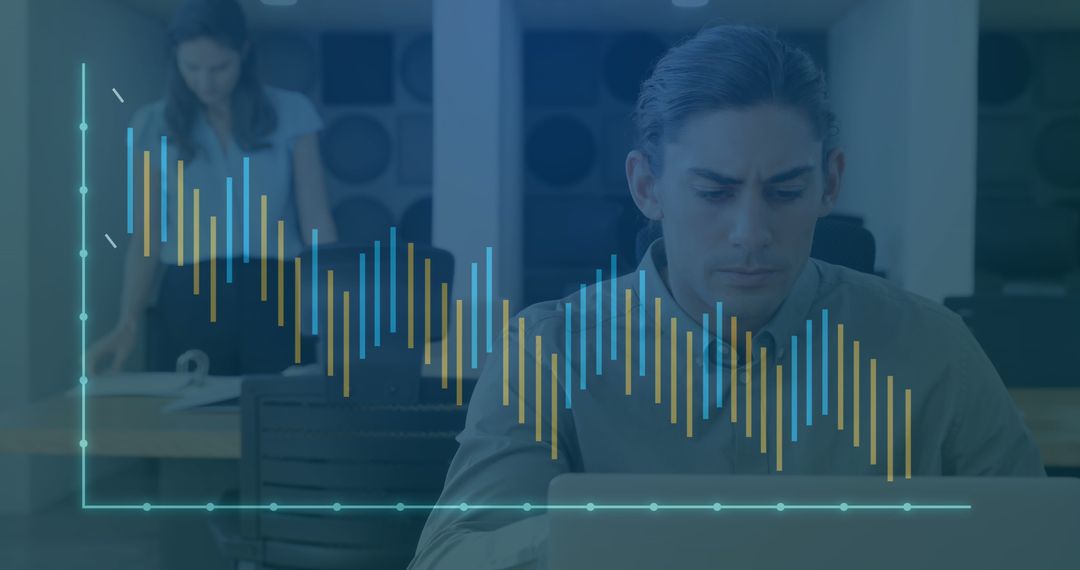 Businessman Analyzing Data with Overlaid Graphs in Office - Free Images, Stock Photos and Pictures on Pikwizard.com