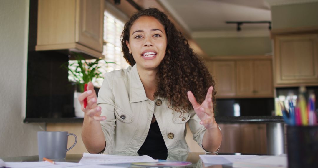 Smiling Biracial Woman Communicating via Video Call at Home