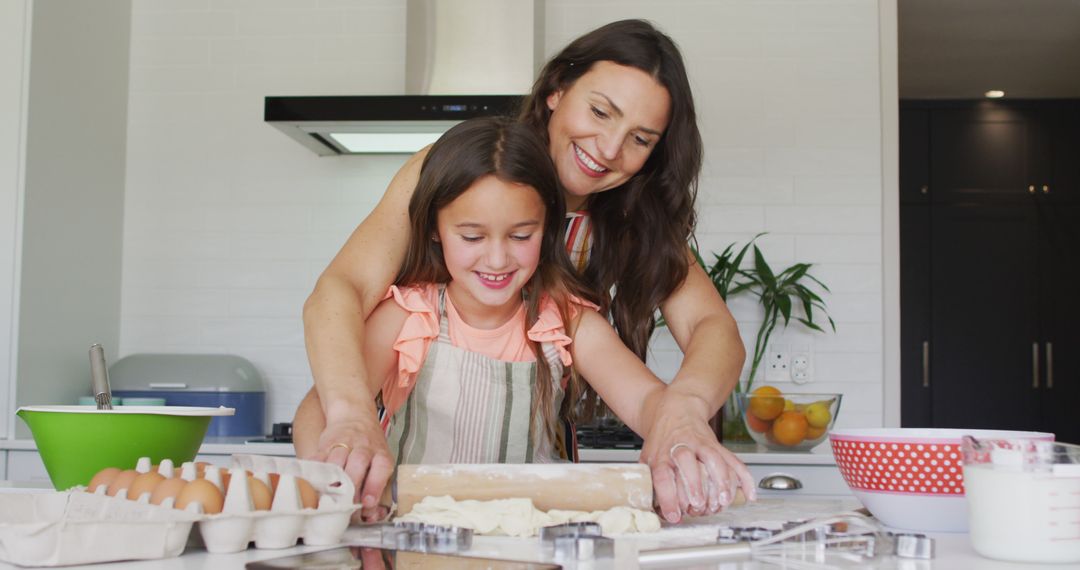 Mother and Daughter Baking Together in a Modern Kitchen - Free Images, Stock Photos and Pictures on Pikwizard.com