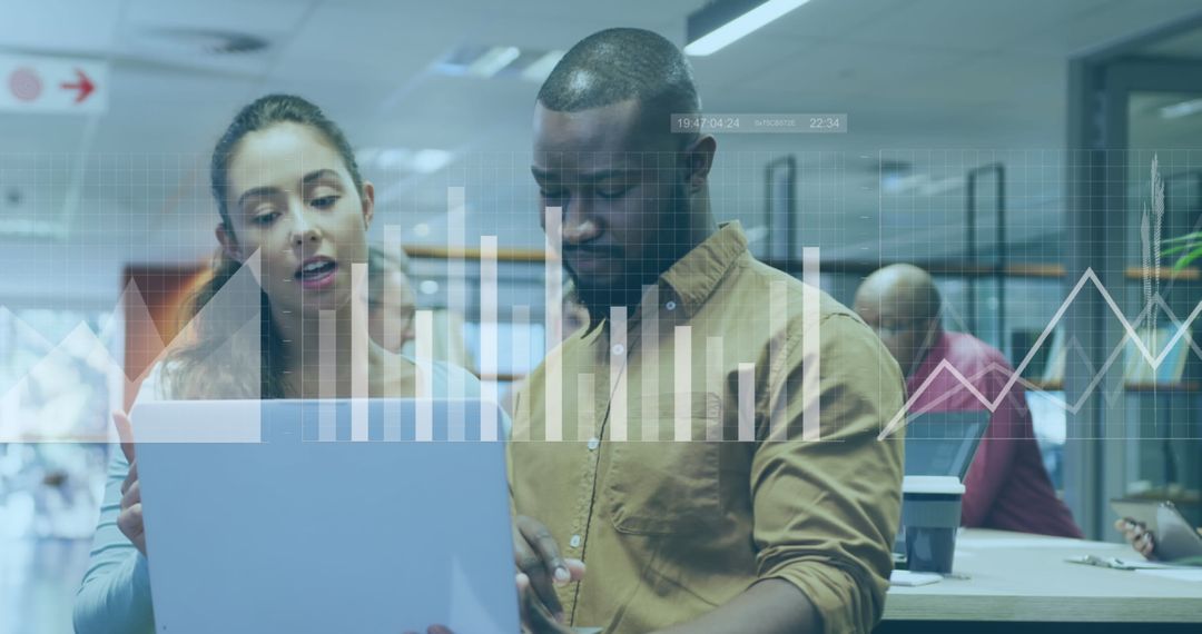 Executives Analyzing Financial Charts in Modern Office Setting