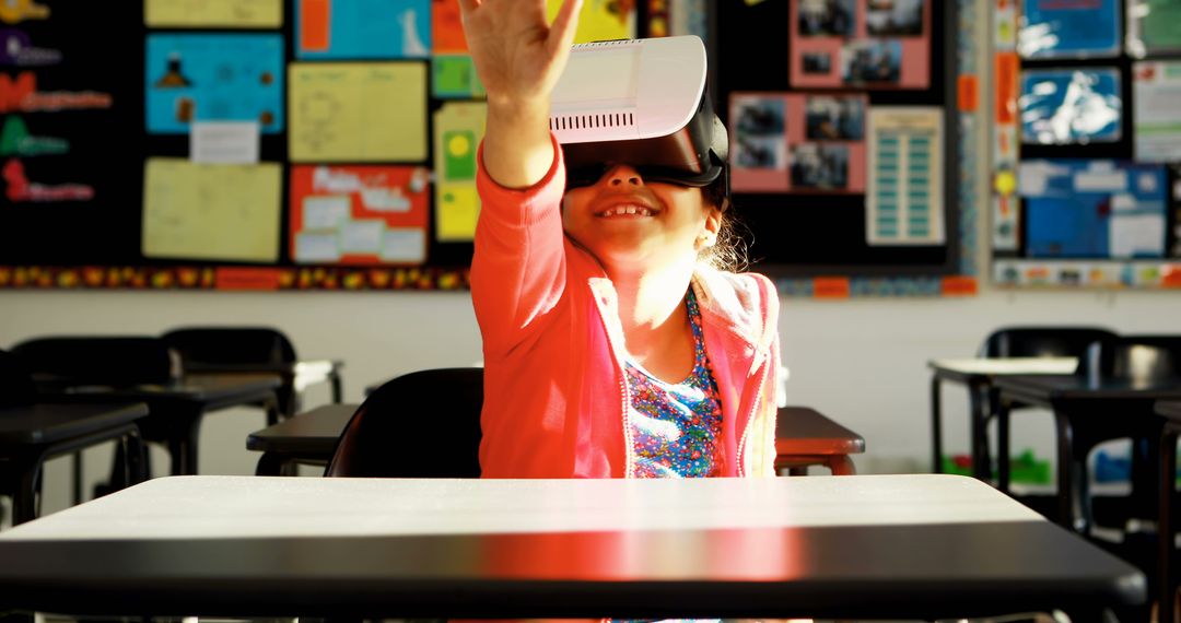 Happy Child Using Virtual Reality Headset in Classroom - Free Images, Stock Photos and Pictures on Pikwizard.com