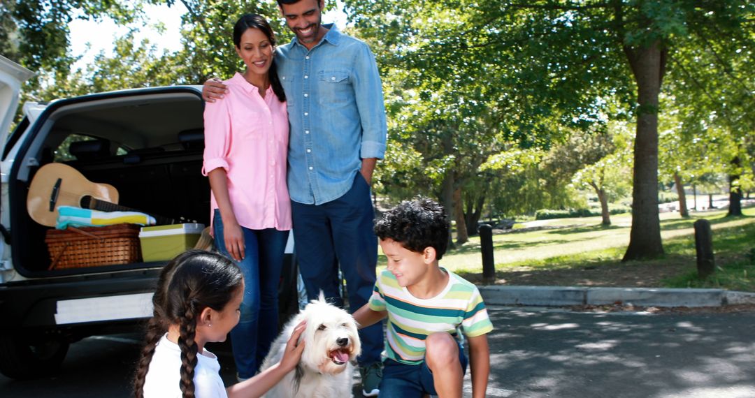 Multiracial Family Taking Road Trip Stopping at Park - Free Images, Stock Photos and Pictures on Pikwizard.com