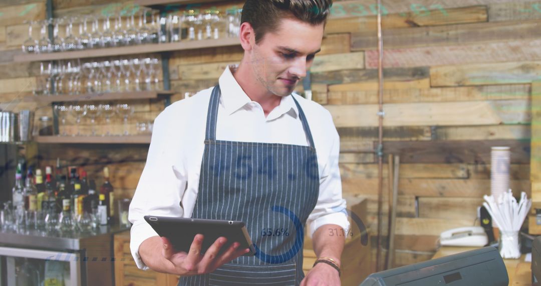 Young Barista Using Digital Tablet Behind Counter at Coffee Shop - Free Images, Stock Photos and Pictures on Pikwizard.com