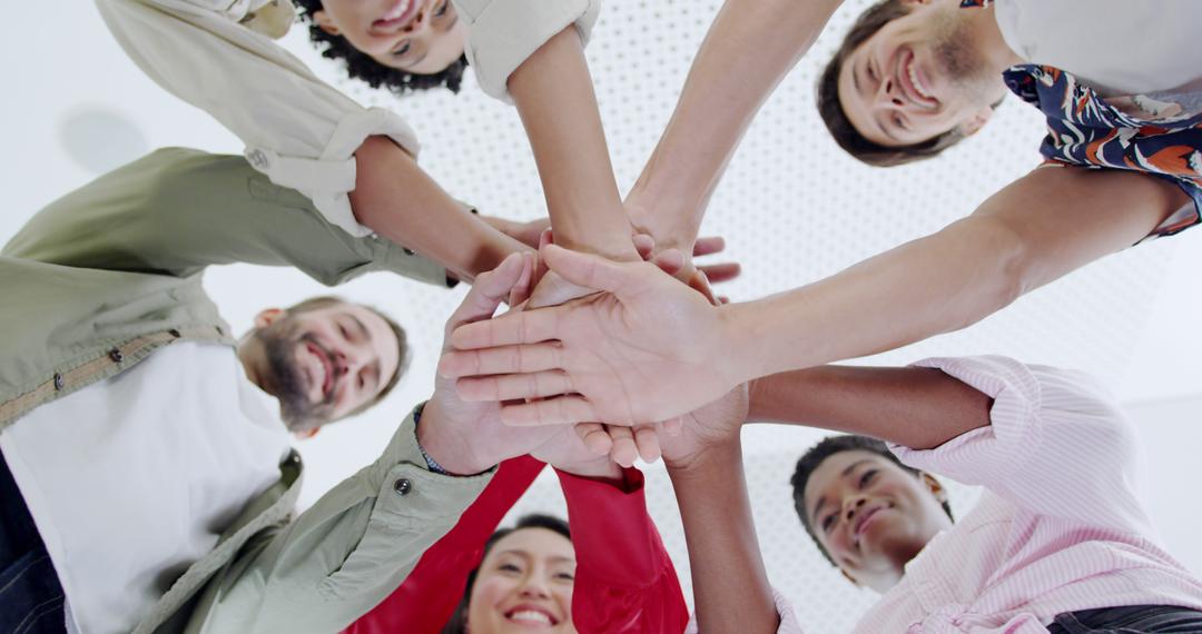 Diverse Team Joining Hands in Unity and Collaboration - Free Images, Stock Photos and Pictures on Pikwizard.com