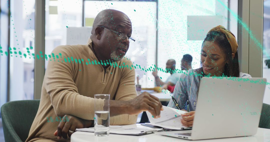 Diverse Professionals Analyzing Data with Digital Overlays