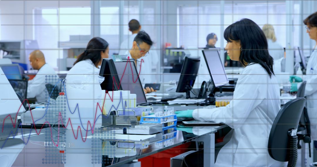 Scientists Analyzing Data in Modern Laboratory Setting