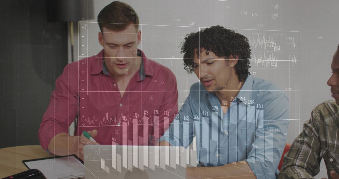 Team Reviewing Documents with Financial Data Overlays in Office